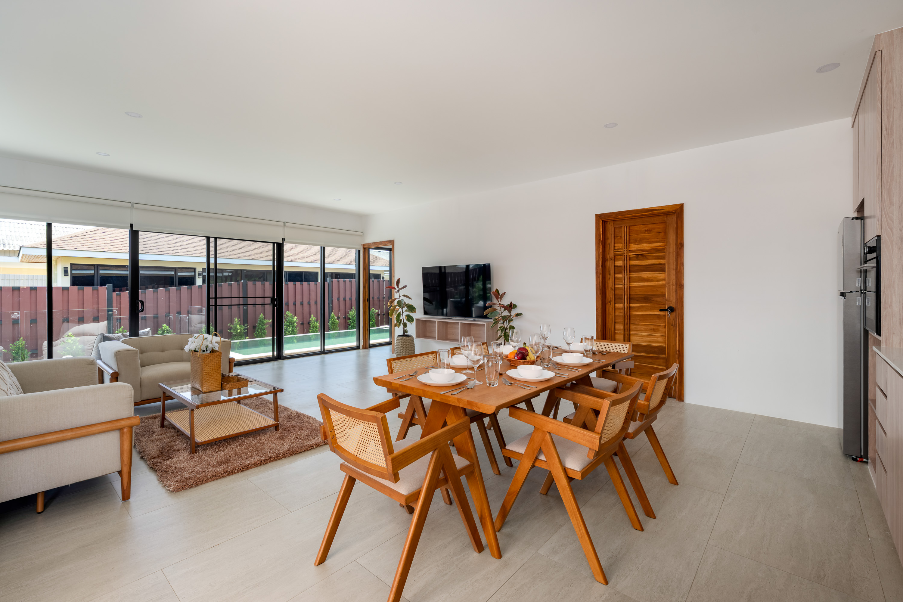 Tropical garden and pool area at Iremia Residence, Bo Put