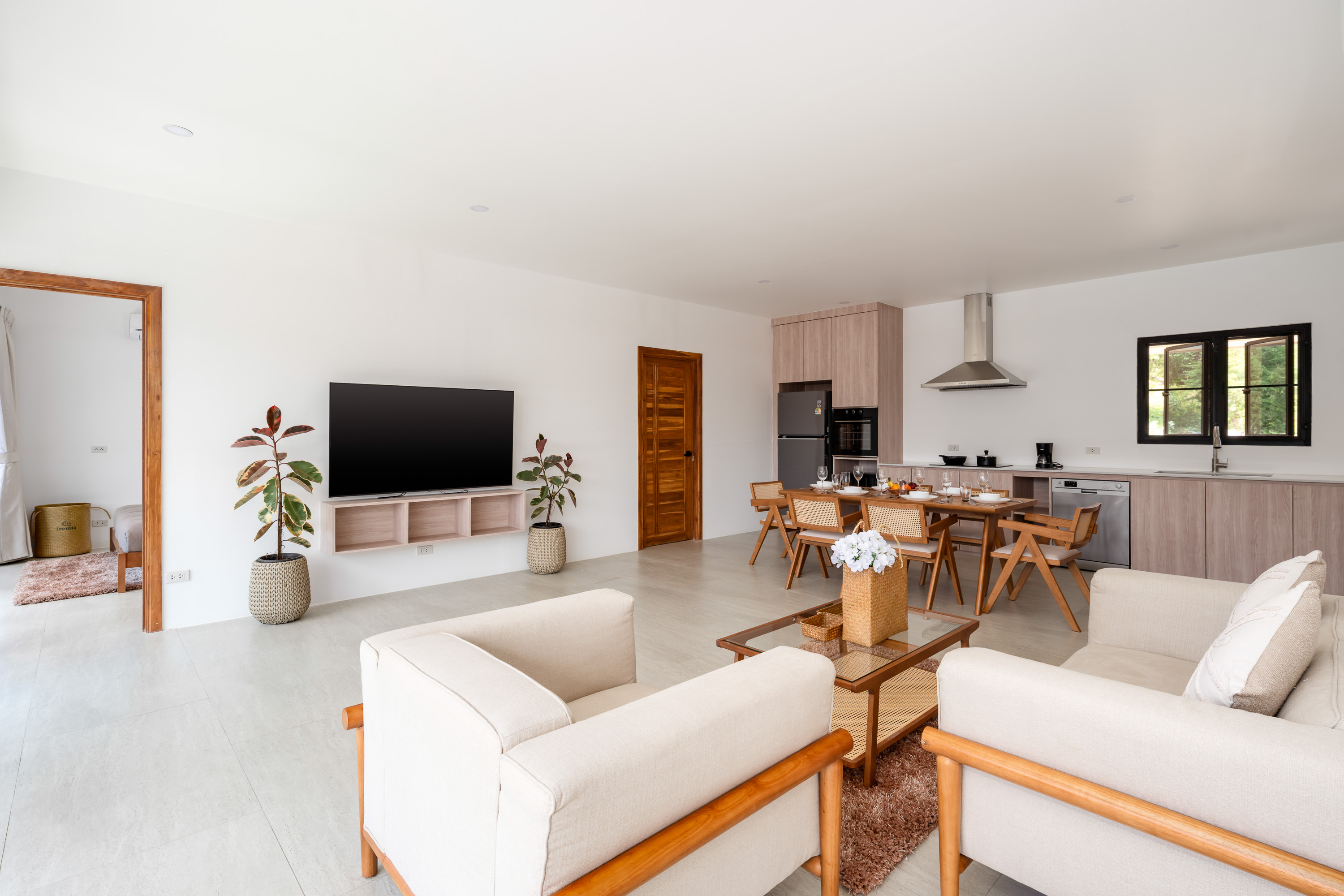 Bright minimalist living room of N26 The White Villa in Bo Put